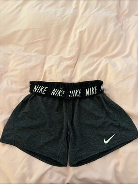Nike Dri-Fit Women's Dark Gray Athletic Shorts with White Swoosh